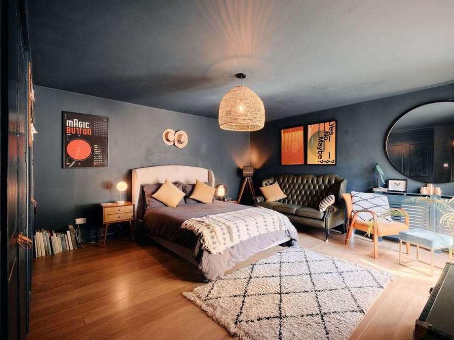 The ink-blue guest bedroom