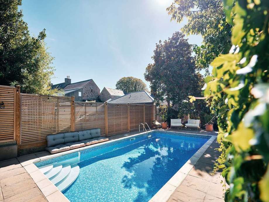 The full length of the pool and deck